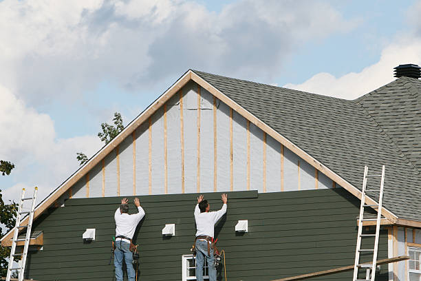 Professional Siding Contractor technician working in Rector, PA